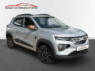 Gebraucht Dacia Spring Extreme 47 kW (65 PS) 2023 Lightninggrau Kleinwagen