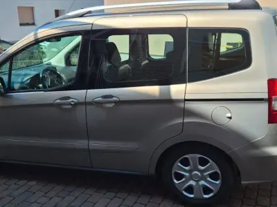 Gebraucht Ford Tourneo Courier Trend 101 PS (74 kW) 2015 Beige Van / Kleinbus
