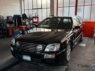 Second-hand Nissan Stagea 200 CP (147 kW) 2000 Negru Break