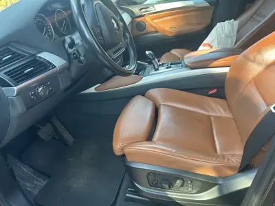 Käytetty BMW X6 Exclusive 245 HP (180 kW) 2013 Musta Katumaasturi