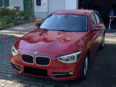 Gebraucht BMW 116 Sport Line 136 PS (100 kW) 2012 Rot Kleinwagen