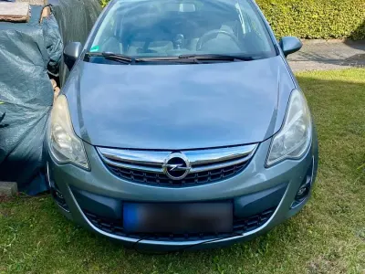 Gebraucht Opel Corsa 85 PS (62 kW) 2012 Silber Kleinwagen