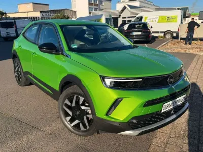 Gebraucht Opel Mokka-e Elegance 100 kW (136 PS) 2022 Mamba green met SUV