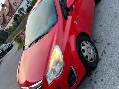 Używany Opel Corsa 87 KM (63 kW) 2012 Czerwony Hatchback