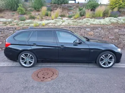 Gebraucht BMW 320 Sport Line 184 PS (135 kW) 2014 Schwarz Kombi