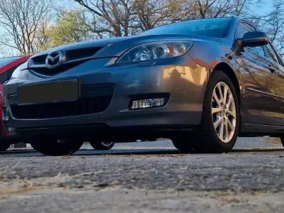 Używany Mazda 3 Active 105 KM (77 kW) 2009 Szary Sedan/Limuzyna