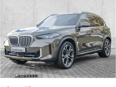 Gebraucht BMW X5 Sport Line 489 PS (359 kW) 2023 Manhattan metallic SUV