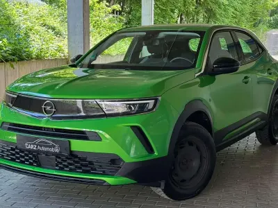 Gebraucht Opel Mokka Basis 101 PS (74 kW) 2021 Matcha green/ikone gruen SUV