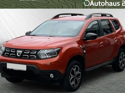 Używany Dacia Duster Comfort 101 KM (74 kW) 2021 Pomarańczowy SUV