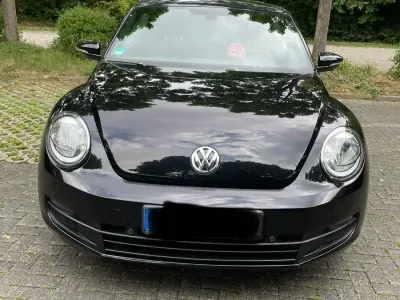 Second-hand VW Beetle 105 CP (77 kW) 2012 Negru Hatchback