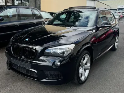 Gebraucht BMW X1 Performance 218 PS (160 kW) 2013 Black sapphire metallic SUV