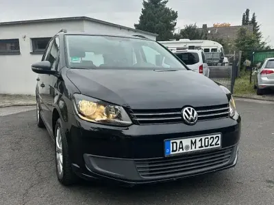 Gebraucht VW Touran Trendline 105 PS (77 kW) 2011 Schwarz Van / Kleinbus