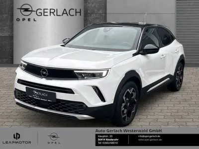 Gebraucht Opel Mokka-e Ultimate 100 kW (136 PS) 2024 Jade weiss/arktis weiss SUV