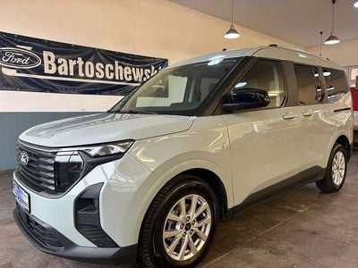 Grau Gebraucht 2024 Ford Tourneo Courier Titanium Van / Kleinbus | 22.500 € (Guter Preis)