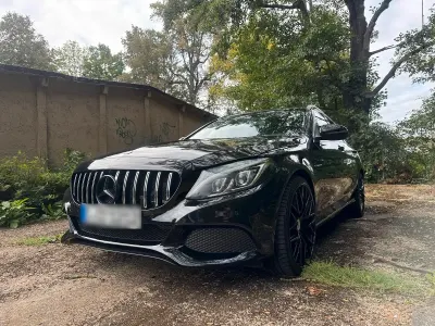Używany Mercedes C250 204 KM (150 kW) 2015 Czarny Kombi