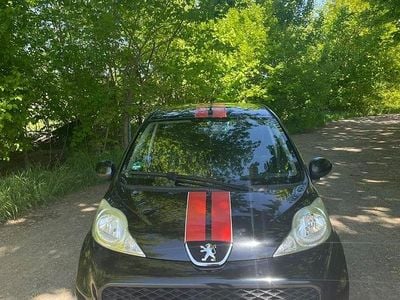 Gebraucht Peugeot 107 68 PS (50 kW) 2010 Schwarz Kleinwagen
