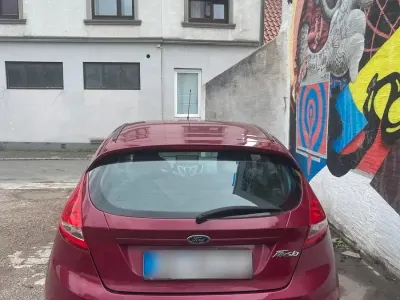 Gebraucht Ford Fiesta 82 PS (60 kW) 2009 Rot Kleinwagen
