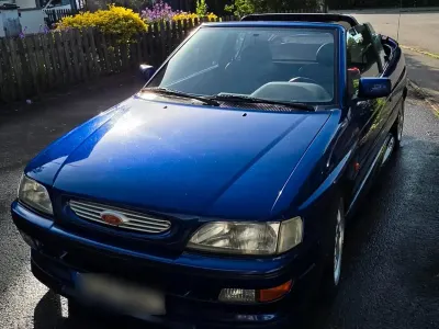 Gebraucht Ford Escort Cabriolet 130 PS (95 kW) 1993 Blau Cabrio