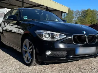 Second-hand BMW 116 Advantage 136 CP (100 kW) 2014 Negru Hatchback