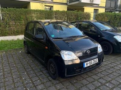 Second-hand Daihatsu Cuore 58 CP (42 kW) 2005 Negru Hatchback