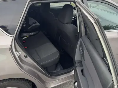 Gebraucht Toyota Auris Hybrid Comfort 136 PS (100 kW) 2014 Braun Kleinwagen