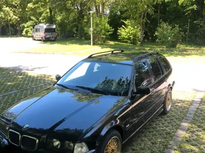Gebraucht BMW 318 M Sport 115 PS (84 kW) 1998 Schwarz Kombi