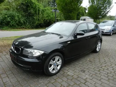 Gebraucht BMW 116 122 PS (89 kW) 2009 Schwarz Kleinwagen