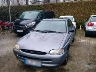 Używany Ford Escort 75 KM (55 kW) 1996 Szary Coupe