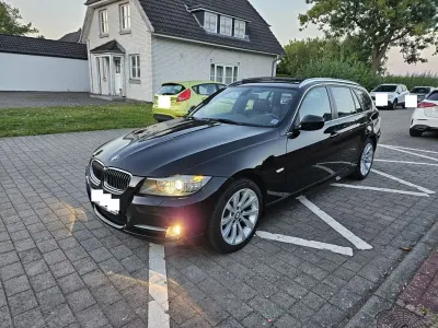 Gebraucht BMW 320 Exclusive 184 PS (135 kW) 2011 Schwarz Kombi