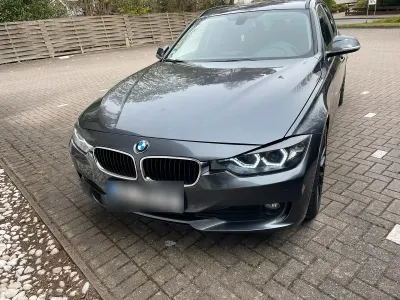 Gebraucht BMW 318 143 PS (105 kW) 2014 Grau Kombi