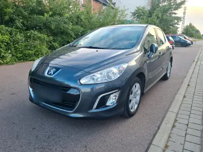 Gebraucht Peugeot 308 120 PS (88 kW) 2012 Grau Limousine