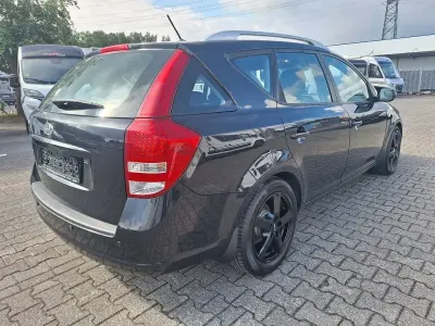 Gebraucht Kia Ceed Sportswagon Edition 7 125 PS (91 kW) 2012 Schwarz Kombi