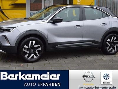 Gebraucht Opel Mokka-e Elegance 100 kW (136 PS) 2022 Kontrast grauquarz silber (metallic) SUV
