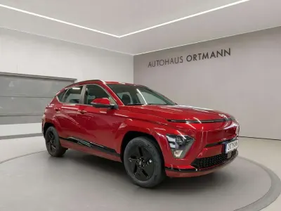 Neu Hyundai Kona Select 99 kW (135 PS) 2026 Ultimate red / met SUV