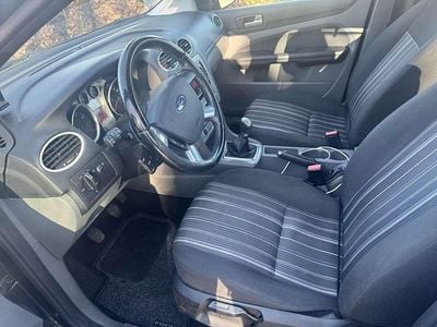 Second-hand Ford Focus Style 101 CP (74 kW) 2008 Albastru Berlinǎ