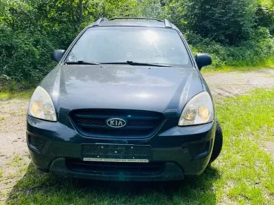 Second-hand Kia Carens LX 144 CP (105 kW) 2008 Gri Monovolum