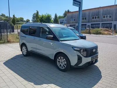 Gebraucht Ford Tourneo Courier Titanium 125 PS (91 kW) 2024 Grau Van / Kleinbus