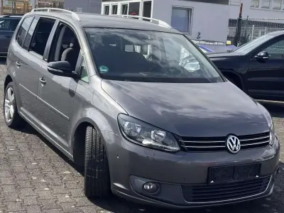 Gebraucht VW Touran Style 105 PS (77 kW) 2012 Pepper grey metallic Van / Kleinbus