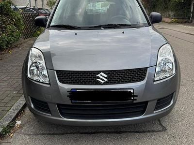 Usado Suzuki Swift 92 HP (67 kW) 2009 Cinzento Citadino