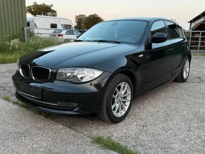 Gebraucht BMW 116 122 PS (89 kW) 2010 Schwarz Kleinwagen