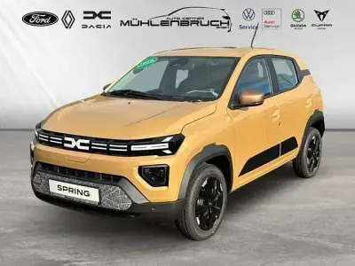 Gebraucht Dacia Spring Extreme 47 kW (65 PS) 2025 Safaribeige Kleinwagen
