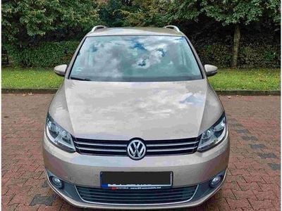 Second-hand VW Touran Comfortline 105 CP (77 kW) 2014 Galben Monovolum