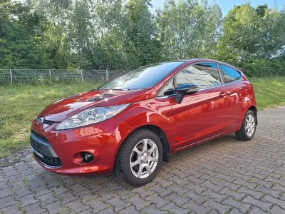 Gebraucht Ford Fiesta Trend 90 PS (66 kW) 2009 Orange Limousine