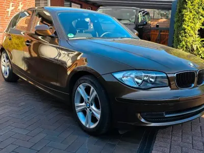 Używany BMW 116 122 KM (89 kW) 2011 Brązowy Hatchback