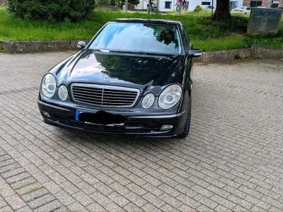 Używany Mercedes E280 Avantgarde 231 KM (169 kW) 2005 Czarny Sedan/Limuzyna
