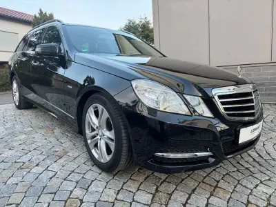 Używany Mercedes E200 184 KM (135 kW) 2011 Czarny Kombi