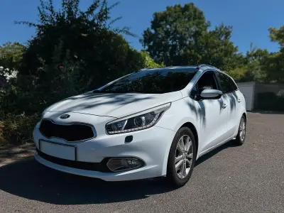 Gebraucht Kia Ceed Spirit 135 PS (99 kW) 2014 Weiß Kleinwagen