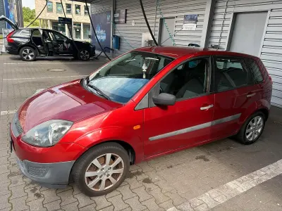 Gebraucht Ford Fiesta 60 PS (44 kW) 2006 Orange Kleinwagen