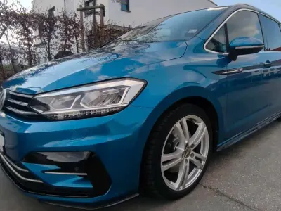 Używany VW Touran 179 KM (131 kW) 2017 Niebieski Minivan