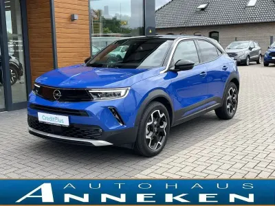 Gebraucht Opel Mokka-e Ultimate 100 kW (136 PS) 2023 Perl blau/voltaik blau SUV